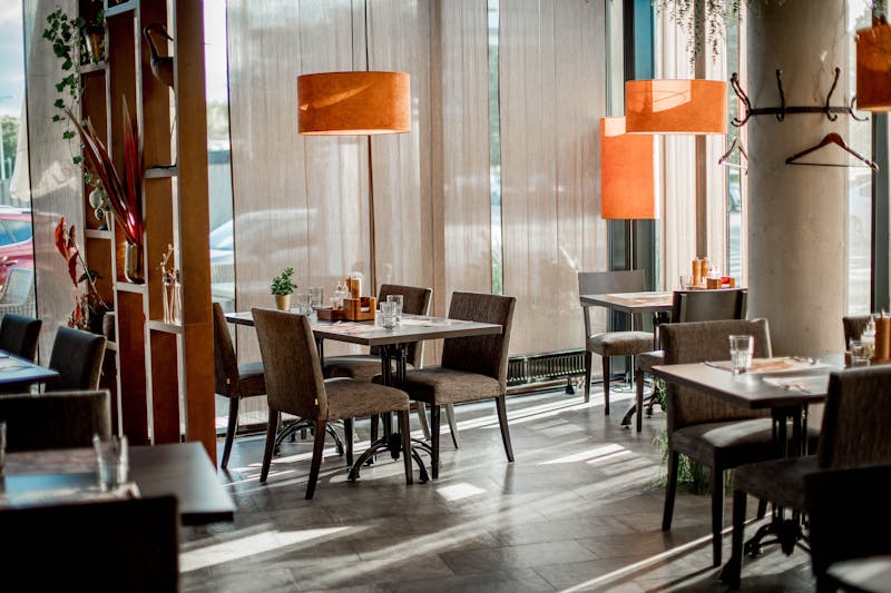 Pizza Ranch kitchen staff hand-tossing fresh pizza dough